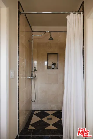 a view of a house with a yard and plants