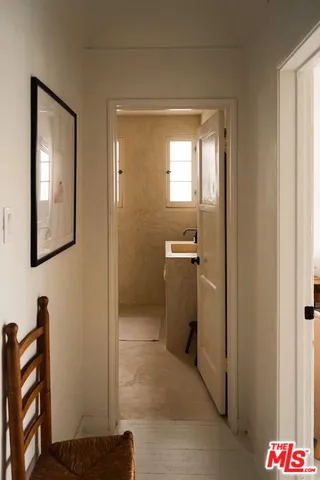 a bedroom with a bed and a cabinets