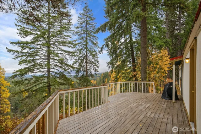 a view of balcony and wooden floor