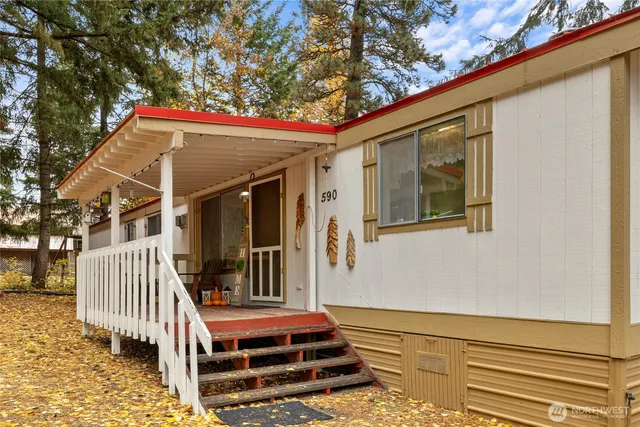 a front view of a house with a porch