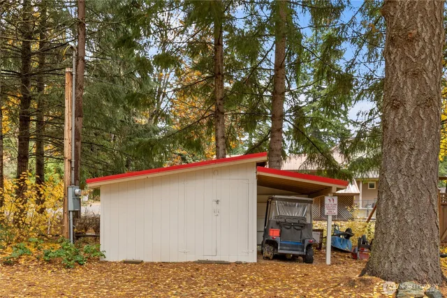 a view of a car park in front of house