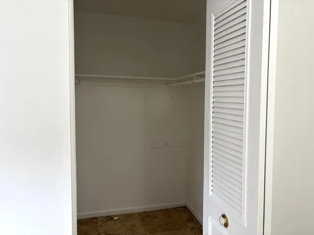 a view of a room that has a window