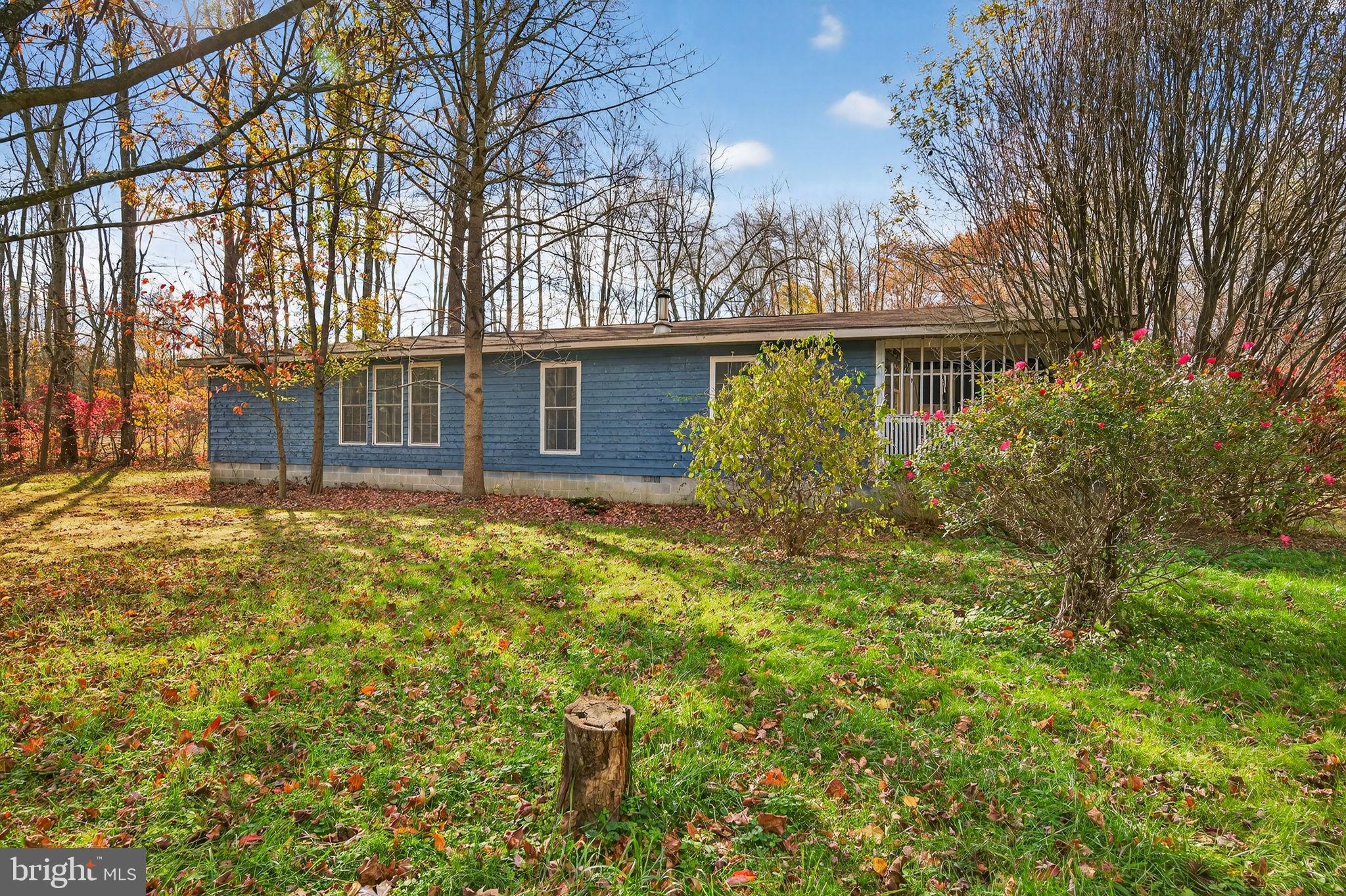 3337 Downs Chapel Road Clayton, DE 19938 - Photo 1 of 54 front view of house with a yard