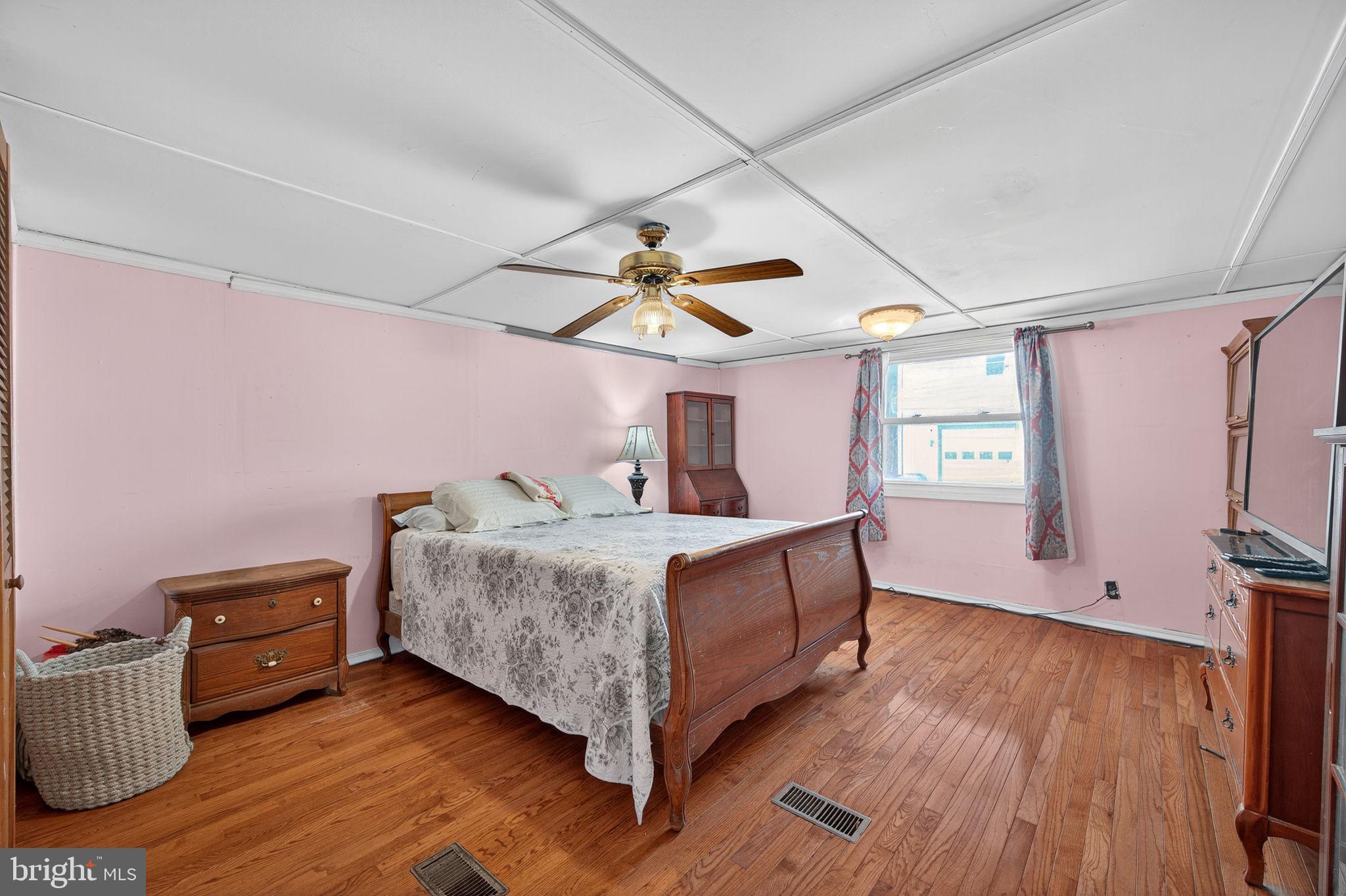 3337 Downs Chapel Road Clayton, DE 19938 - Photo 19 of 54 a bed room with furniture and a window