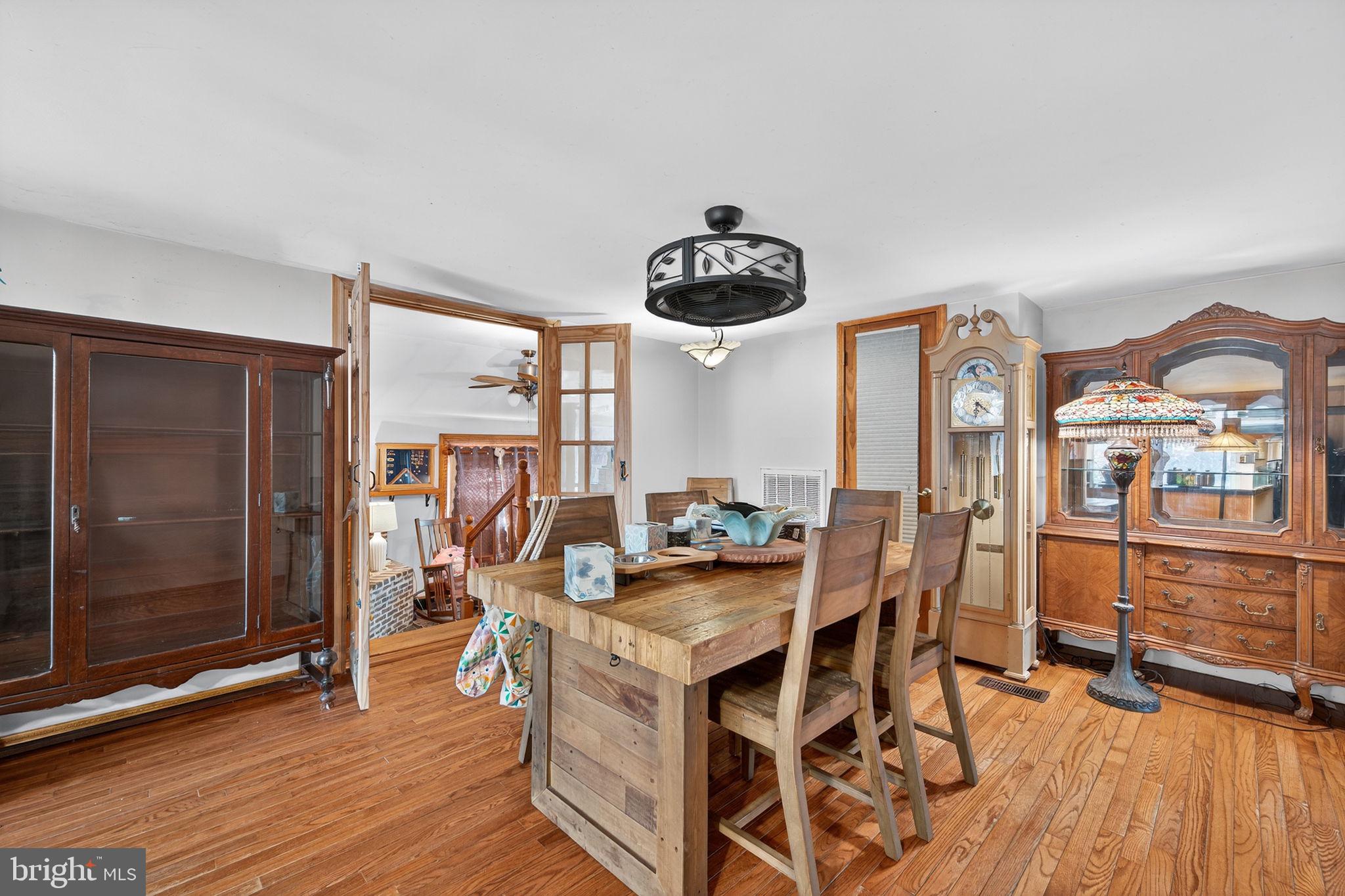 3337 Downs Chapel Road Clayton, DE 19938 - Photo 28 of 54 a kitchen with stainless steel appliances granite countertop a stove and a refrigerator