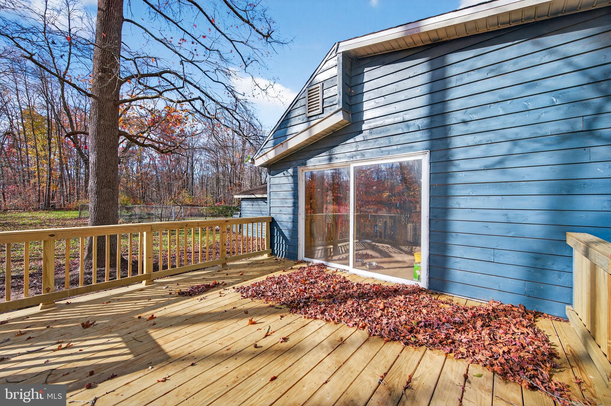 3337 Downs Chapel Road Clayton, DE 19938 - Photo 41 of 54 a view of a balcony with wooden floor and fence