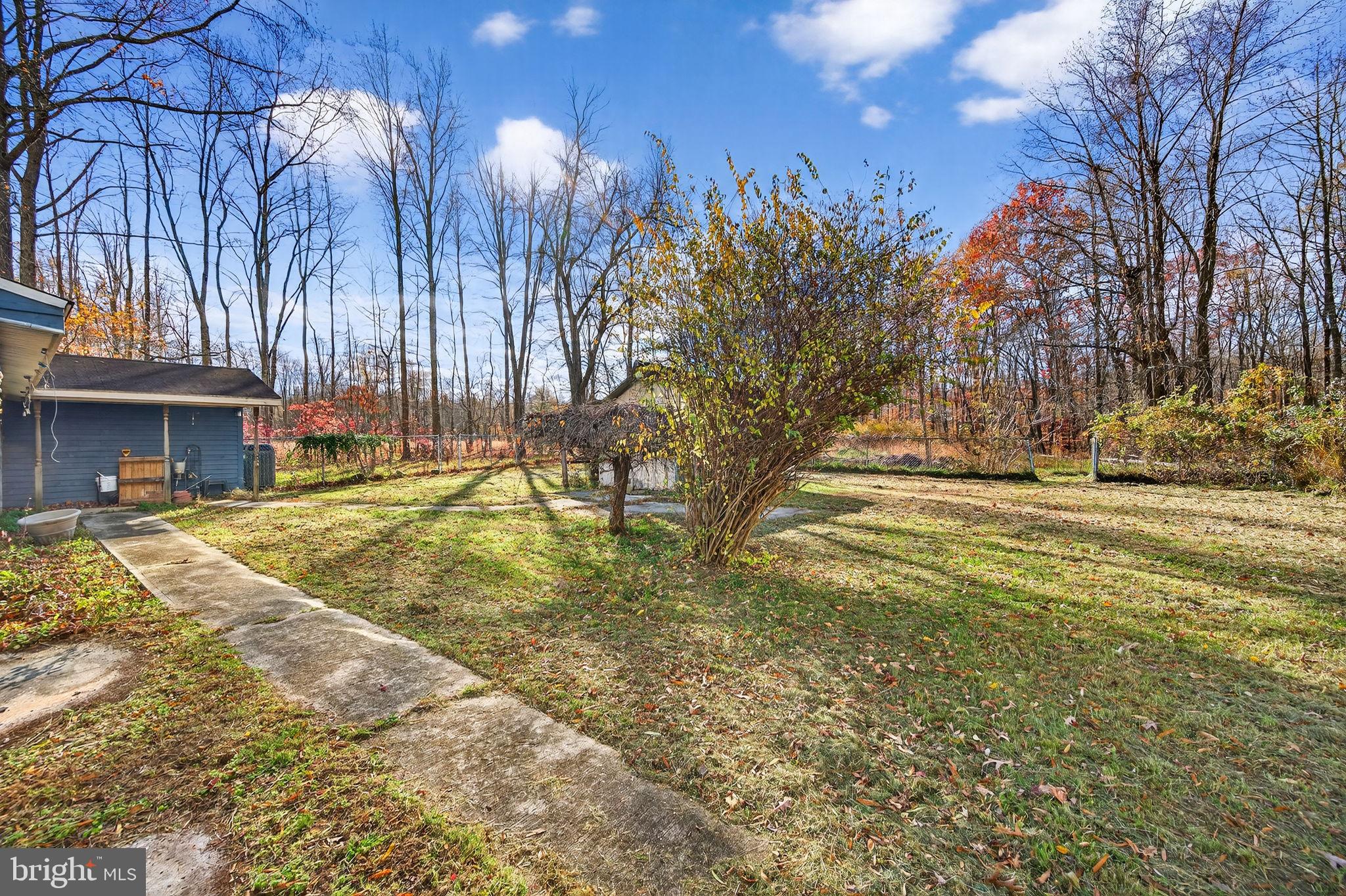 3337 Downs Chapel Road Clayton, DE 19938 - Photo 47 of 54 a swimming pool with an outdoor space and seating area