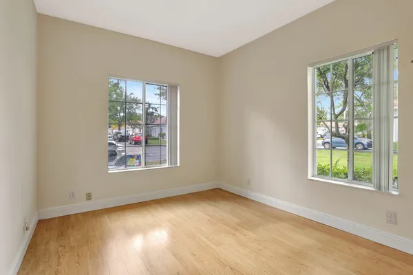 an empty room with windows