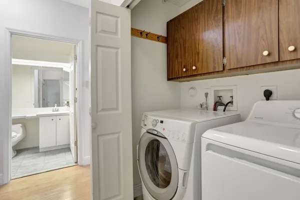a utility room with dryer and washer
