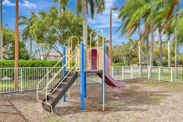 a view of a park with a slide