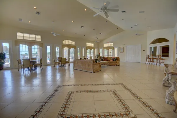 a lobby with furniture and a view of living room