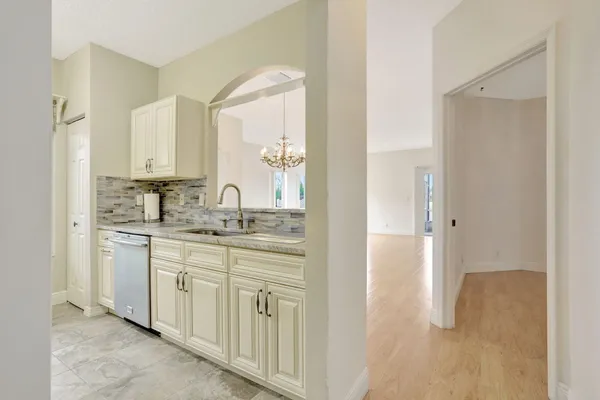 a bathroom with a double vanity sink and mirror