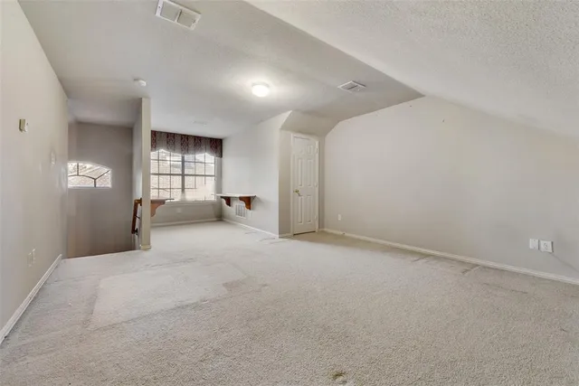 a view of a livingroom with a staircase