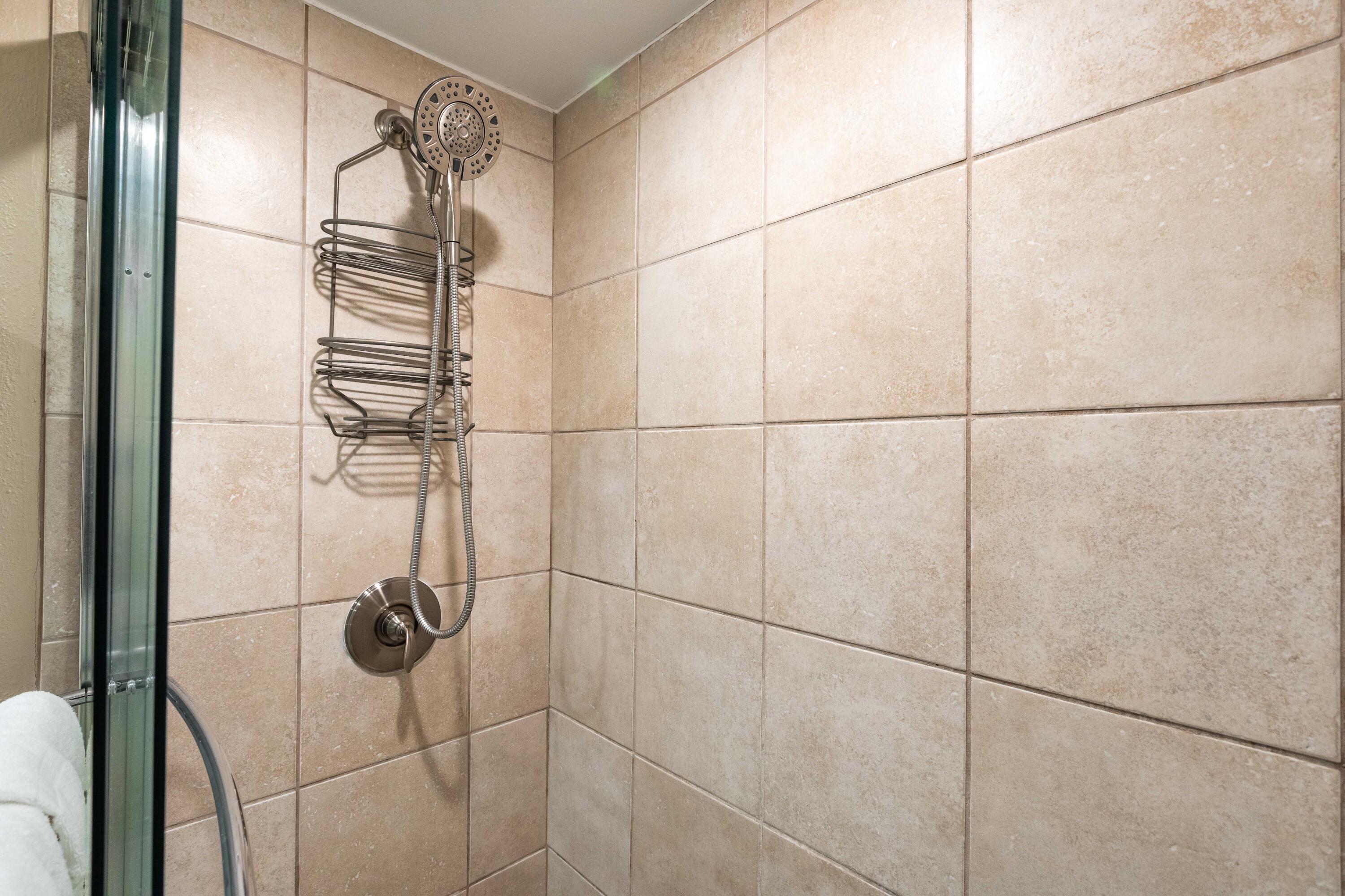 1030 East E Highway, Unit 25 Destin, FL 32541 - Photo 14 of 34 a bathroom with a shower