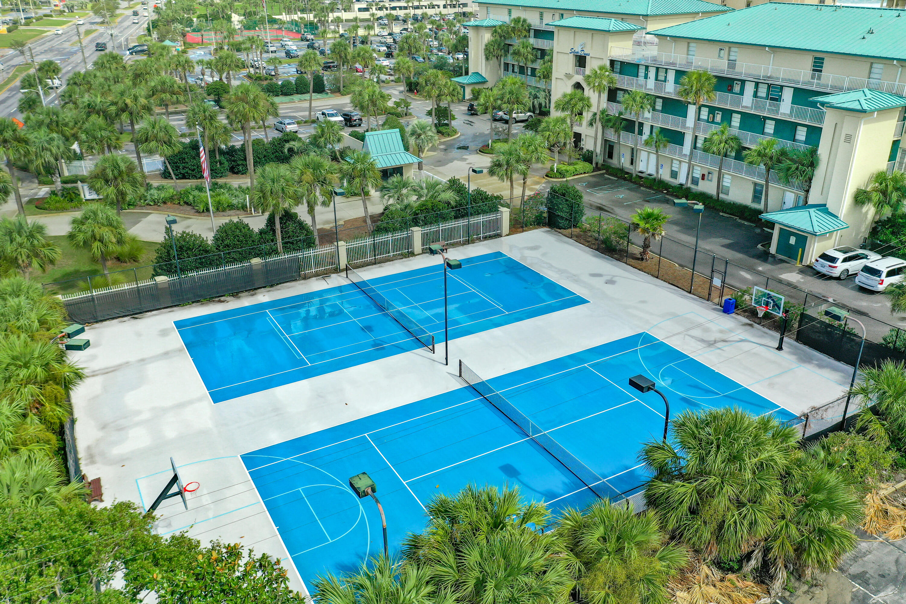 1030 East E Highway, Unit 25 Destin, FL 32541 - Photo 34 of 34 a view of a pool with a yard