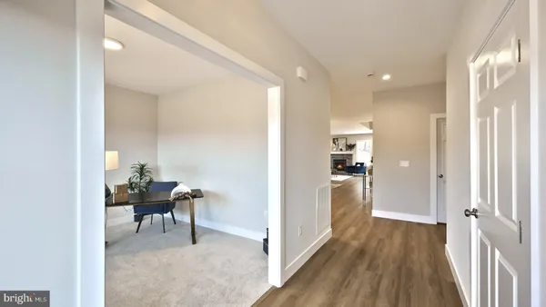 a bedroom with a bed chair and window