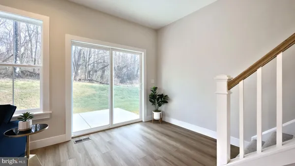 a workspace with furniture and a window