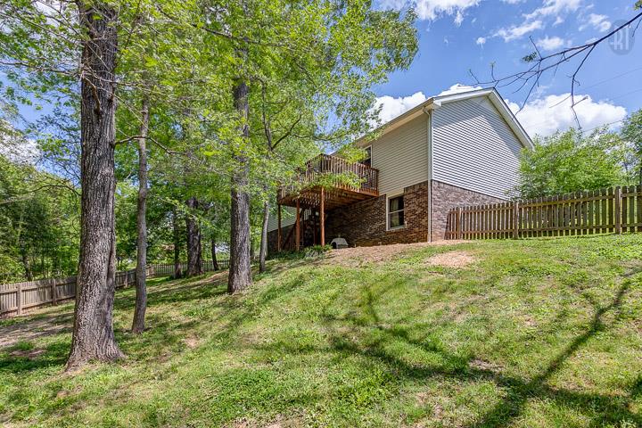 7102 Totty Road Fairview, TN 37062 - Photo 23 of 27 Another View from the Back Corner of the Yard Showing Full Walk Out Basement