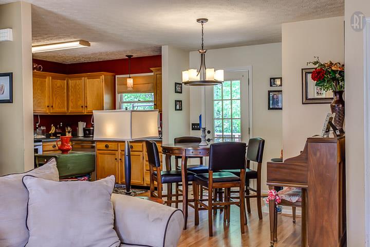 7102 Totty Road Fairview, TN 37062 - Photo 9 of 27 Breakfast area and large kitchen and door leading to deck