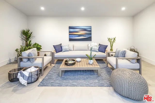 an aerial view of a house with mountain view