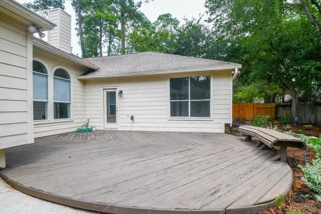 a backyard of a house with seating space