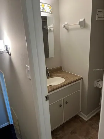 a bathroom with a bath tub