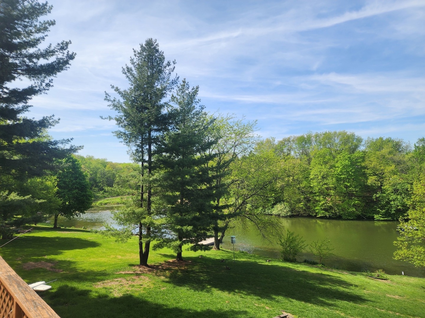 871 Buffalo Run Danvers, IL 61732 - Photo 5 of 8 a view of a lake with a yard