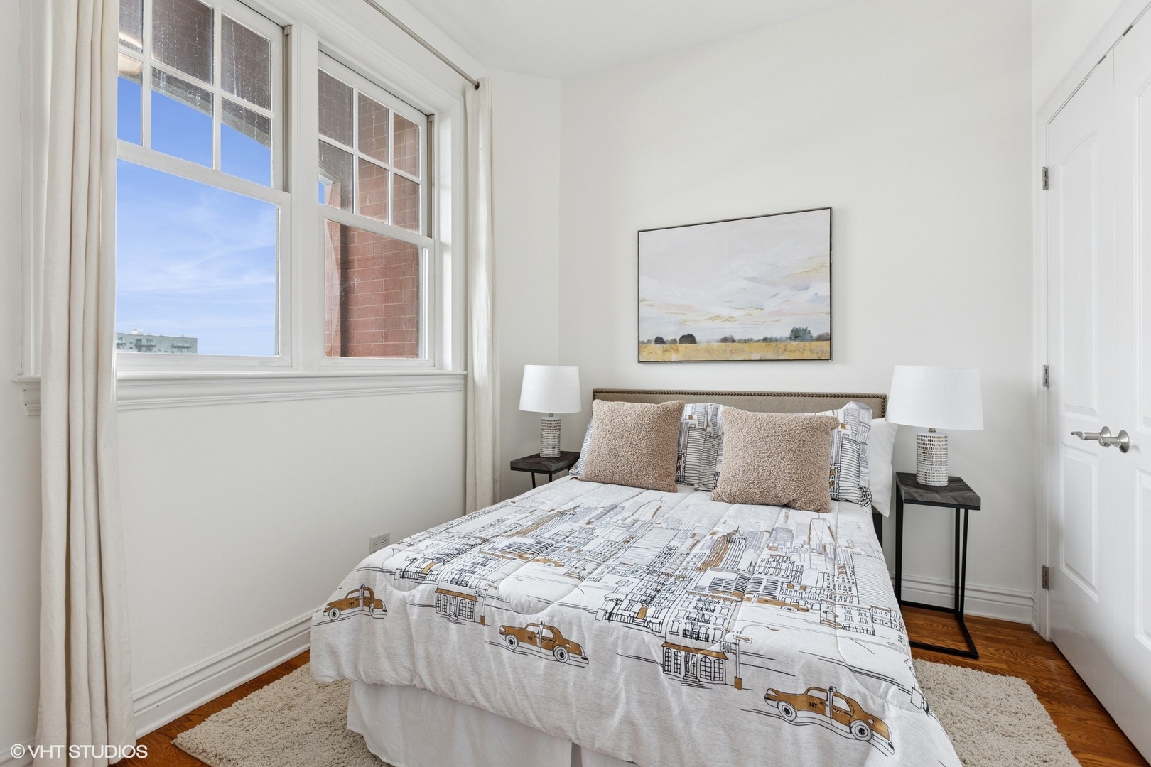 35 South Racine Avenue, Unit 6SE Chicago, IL 60607 - Photo 21 of 26 a bedroom with a bed and a window