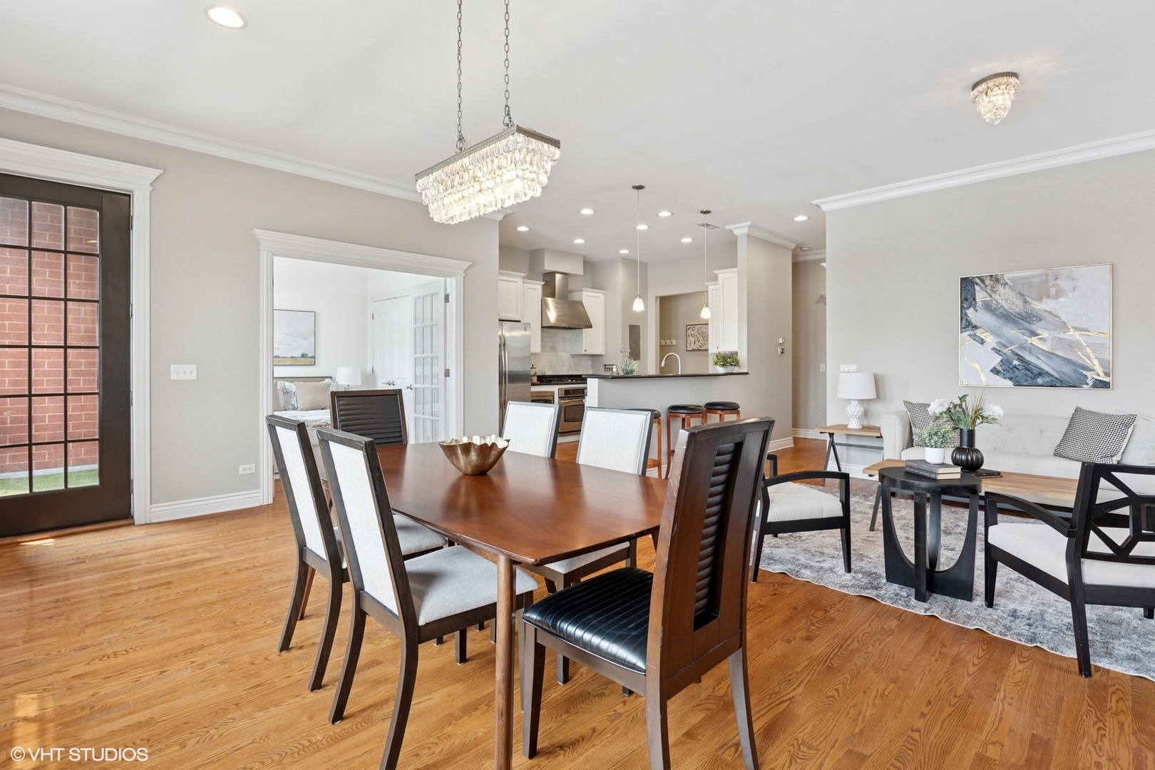 35 South Racine Avenue, Unit 6SE Chicago, IL 60607 - Photo 6 of 26 a view of a dining room with furniture and wooden floor