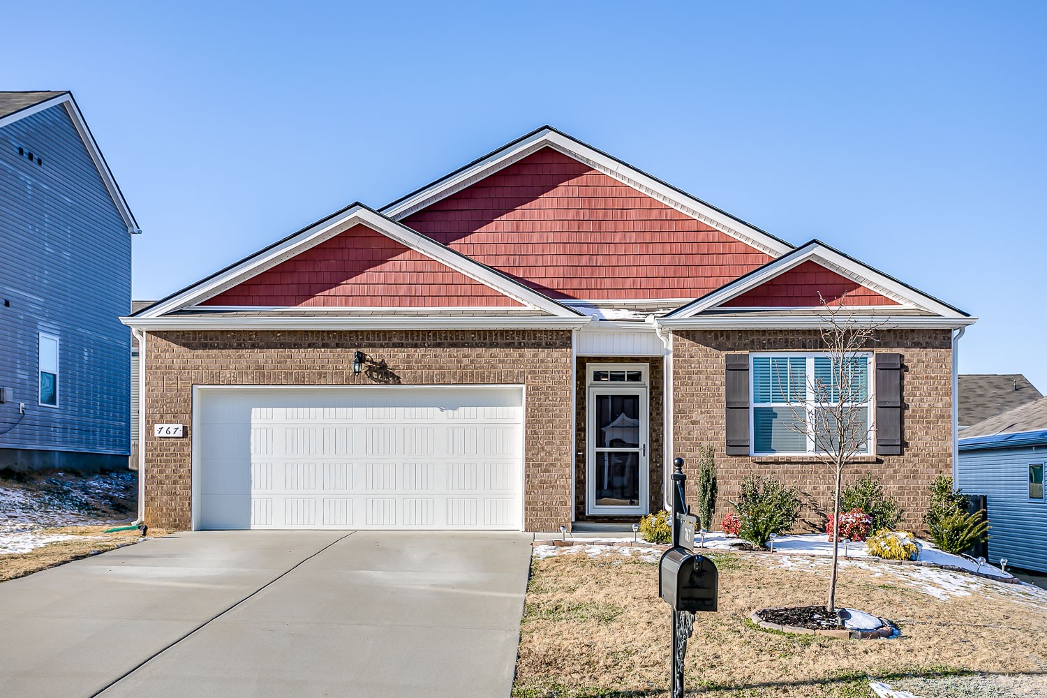 767 Prominence Road Columbia, TN 38401 - Photo 1 of 38 a front view of a house with garden