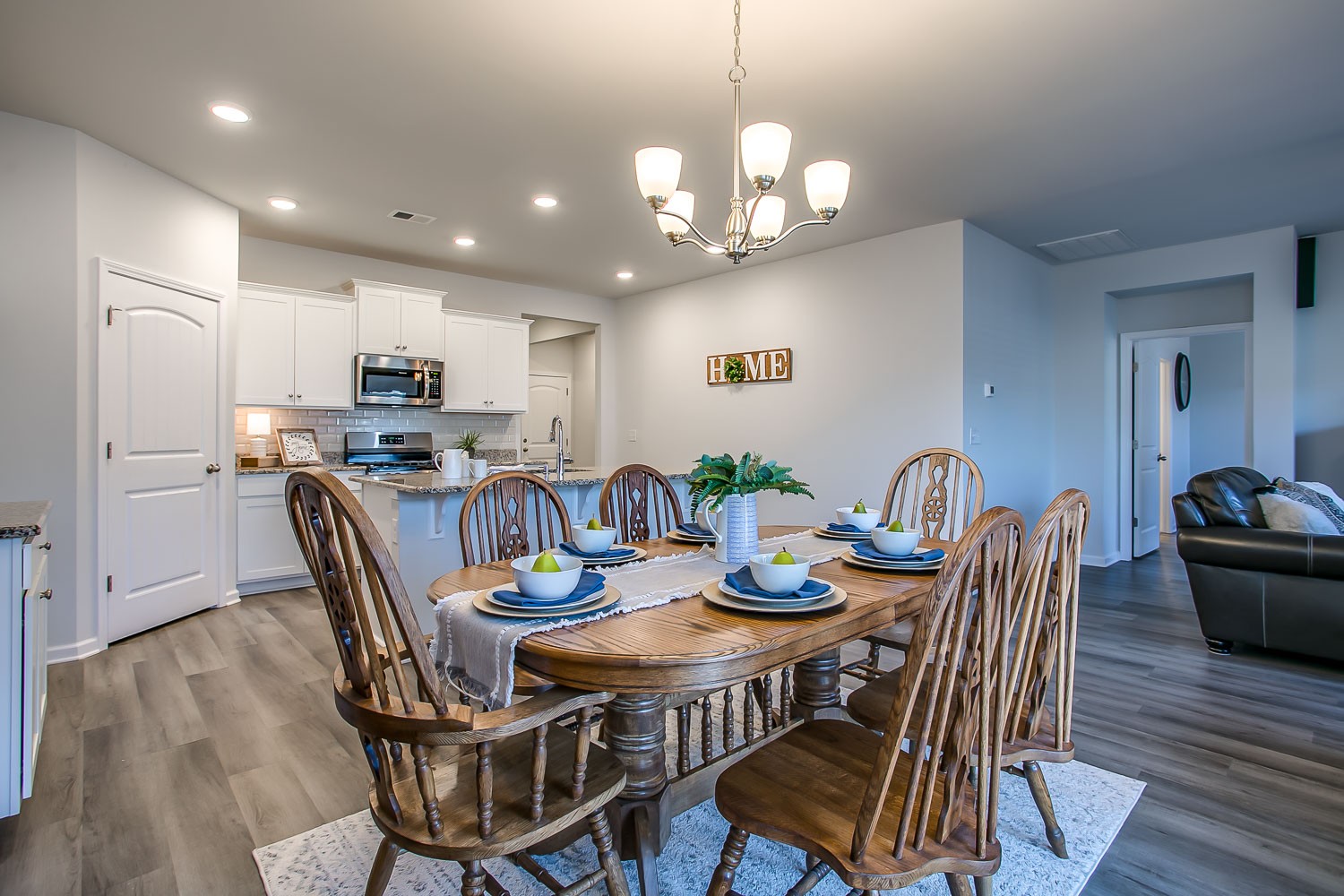 767 Prominence Road Columbia, TN 38401 - Photo 11 of 38 a view of a dining room with furniture wooden floor and chandelier