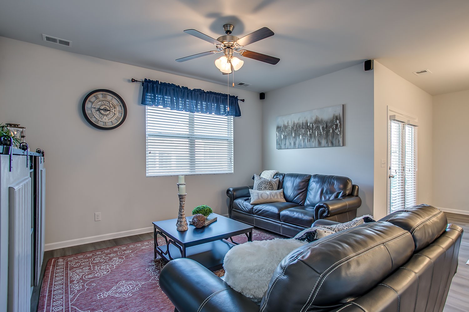 767 Prominence Road Columbia, TN 38401 - Photo 17 of 38 a living room with furniture a clock on wall and a window