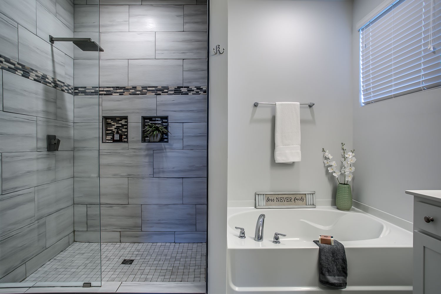 767 Prominence Road Columbia, TN 38401 - Photo 21 of 38 a bathroom with a tub a sink and shower