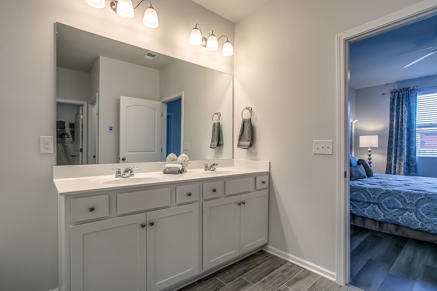 767 Prominence Road Columbia, TN 38401 - Photo 24 of 38 a en suite bathroom with a double vanity sink and a mirror