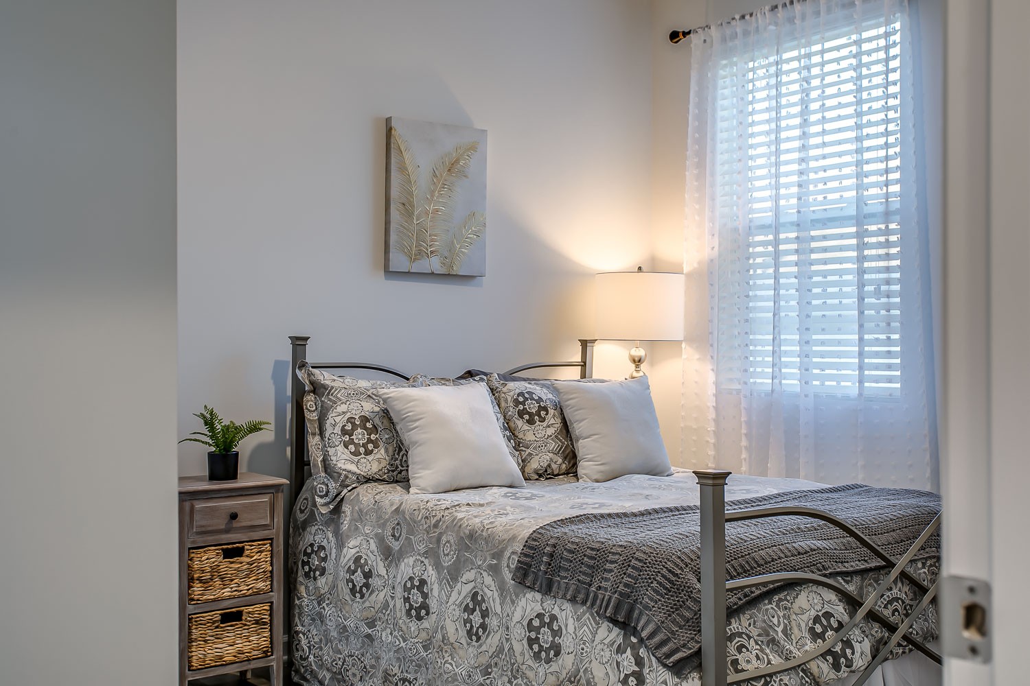 767 Prominence Road Columbia, TN 38401 - Photo 26 of 38 a bed sitting in a bedroom next to a window