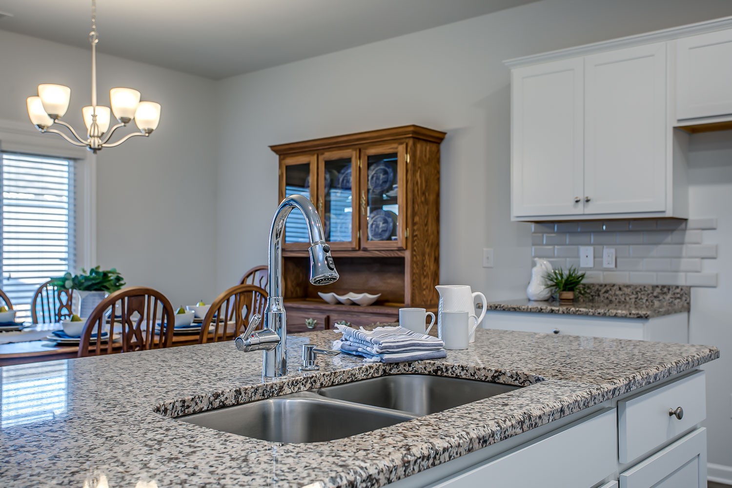 767 Prominence Road Columbia, TN 38401 - Photo 8 of 38 a kitchen with stainless steel appliances granite countertop a sink a counter space and a window
