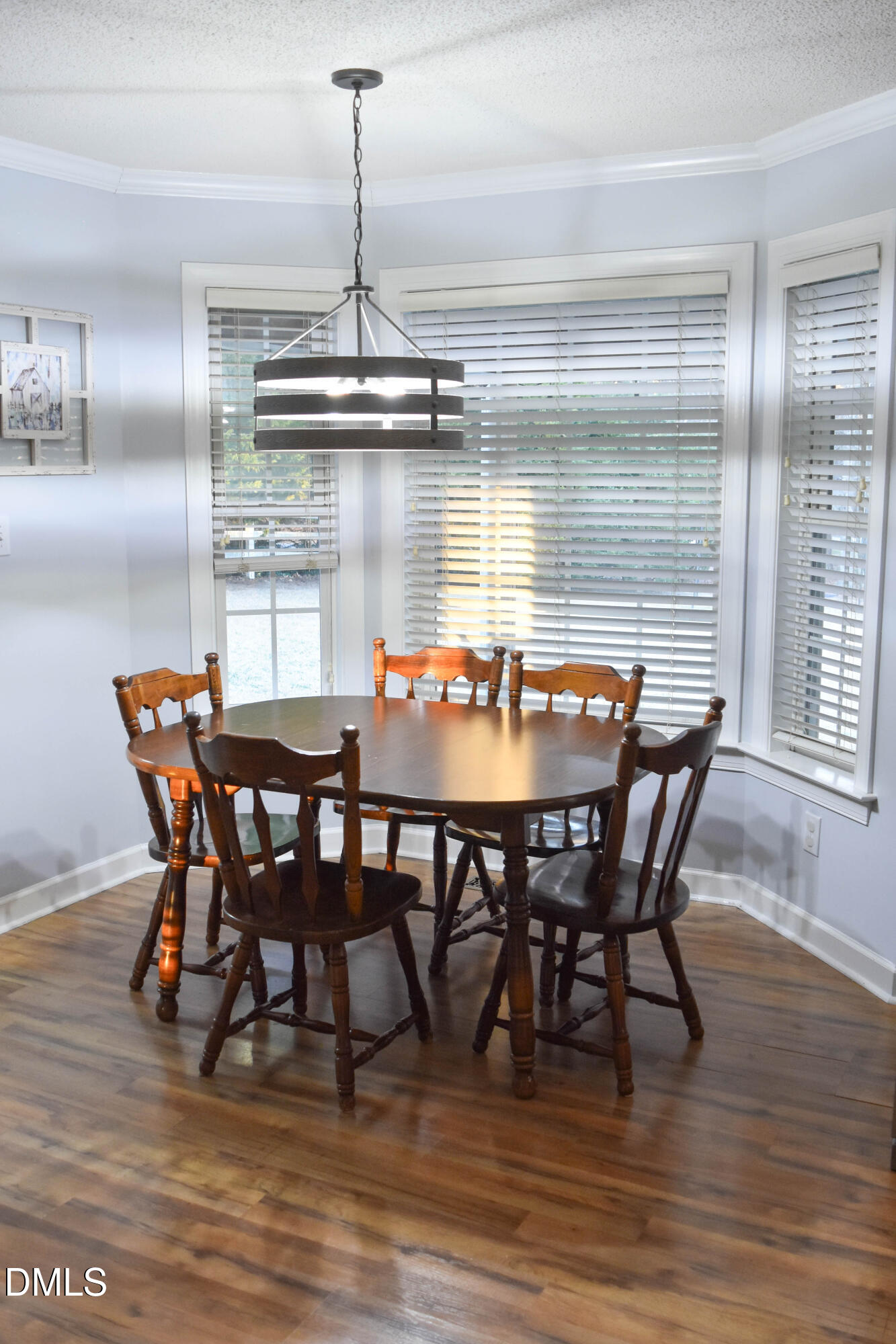 5908 Deep Spring Circle Wake Forest, NC 27587 - Photo 8 of 51 a view of a dining room with furniture window and wooden floor
