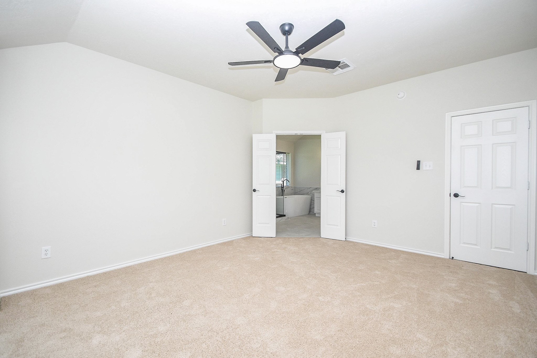 4810 Arbor Court Rosenberg, TX 77471 - Photo 13 of 20 a view of a big room with wooden floor and a ceiling fan