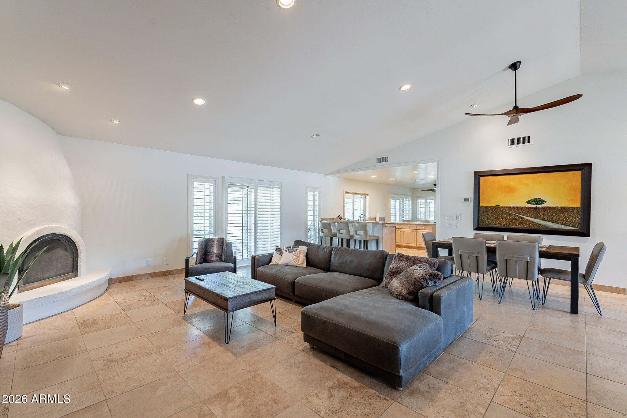 4226 East North Lane Phoenix, AZ 85028 - Photo 10 of 43 a living room with furniture and a flat screen tv