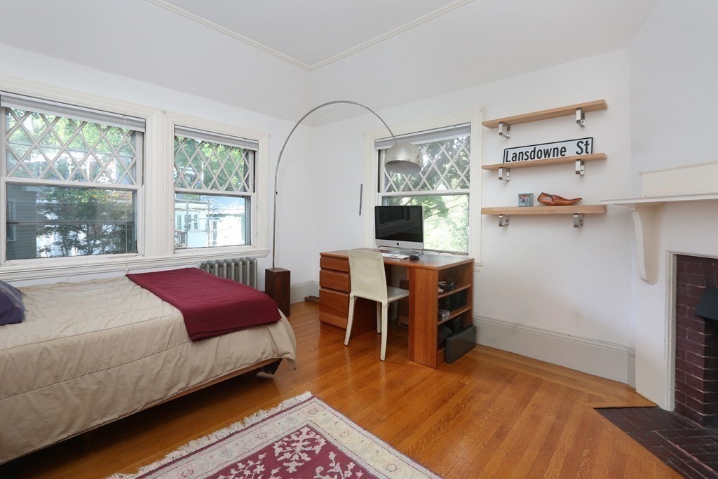 53 Brington Road Brookline, MA 02445 - Photo 8 of 12 a bed room with a bed and window