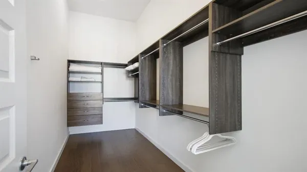 a bathroom with a sink vanity and mirror