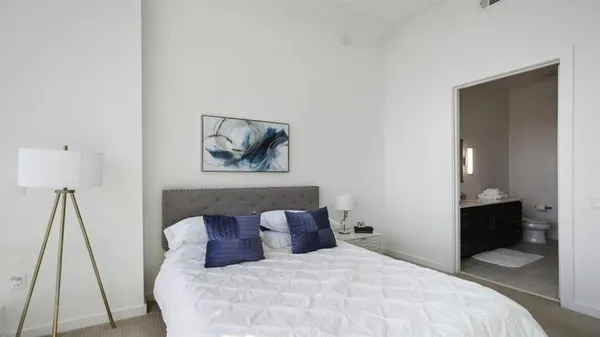 a bathroom with a tub and a shower