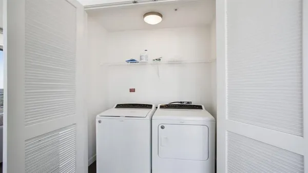 a balcony with an outdoor seating