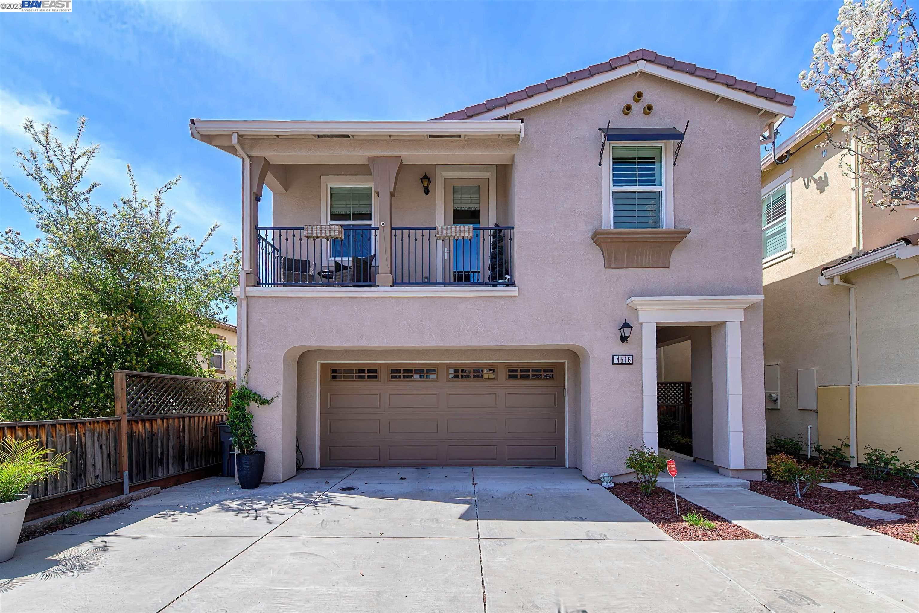a front view of a house with a garage