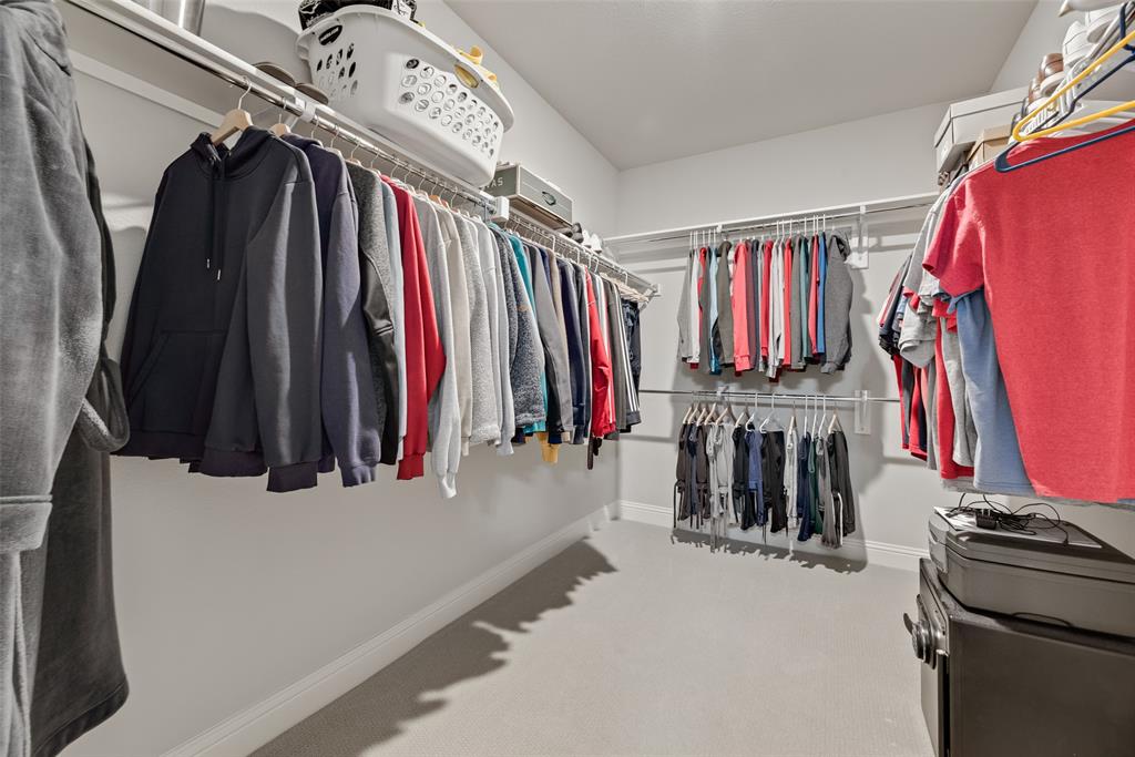 2425 Eclipse Place Celina, TX 75009 - Photo 20 of 40 a view of walk in closet with clothes