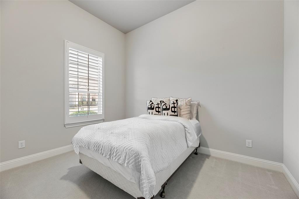 2425 Eclipse Place Celina, TX 75009 - Photo 23 of 40 a bedroom with a bed and a window