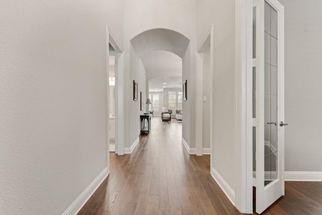 2425 Eclipse Place Celina, TX 75009 - Photo 3 of 40 a view of a hallway with wooden floor