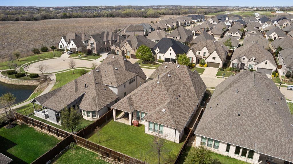 2425 Eclipse Place Celina, TX 75009 - Photo 31 of 40 an aerial view of a house with outdoor space and lake view