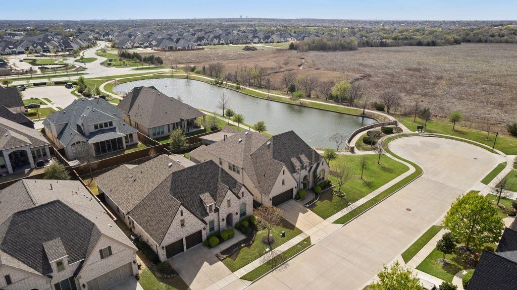 2425 Eclipse Place Celina, TX 75009 - Photo 32 of 40 an aerial view of a house with outdoor space and lake view