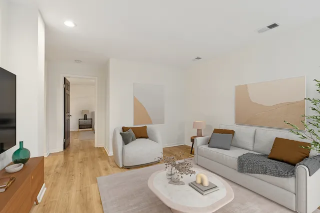 a living room with furniture and a couch